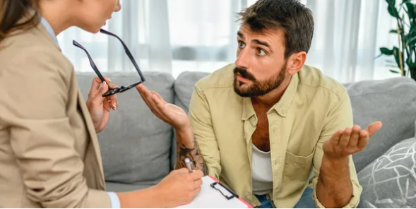 Therapist meeting with a parent