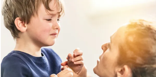 Parent supporting a child
